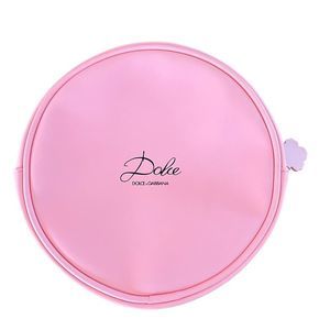 Dolce and Gabbana bubblegum pink cosmetic bag. Round make up bag. Lovely!